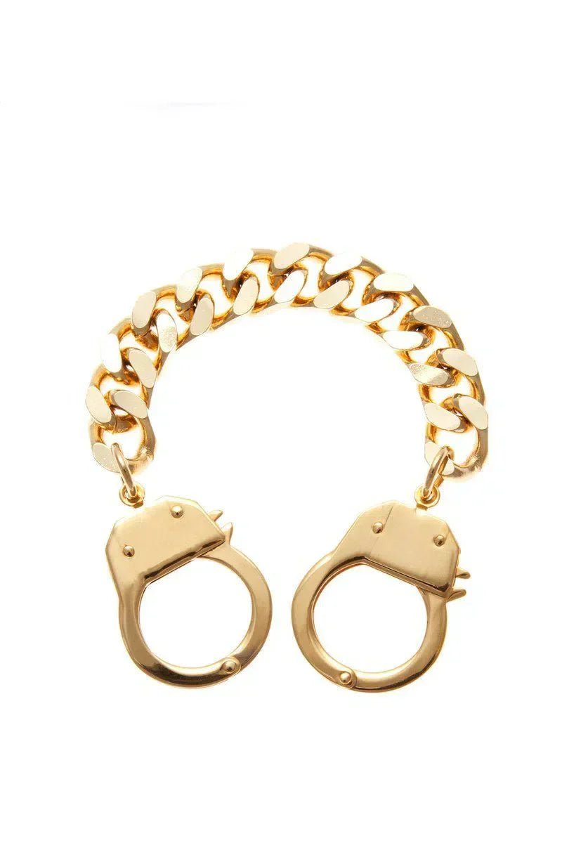 Gold handcuff bracelet showcased in Sophia Bush Wears Eklexic April 2014 article