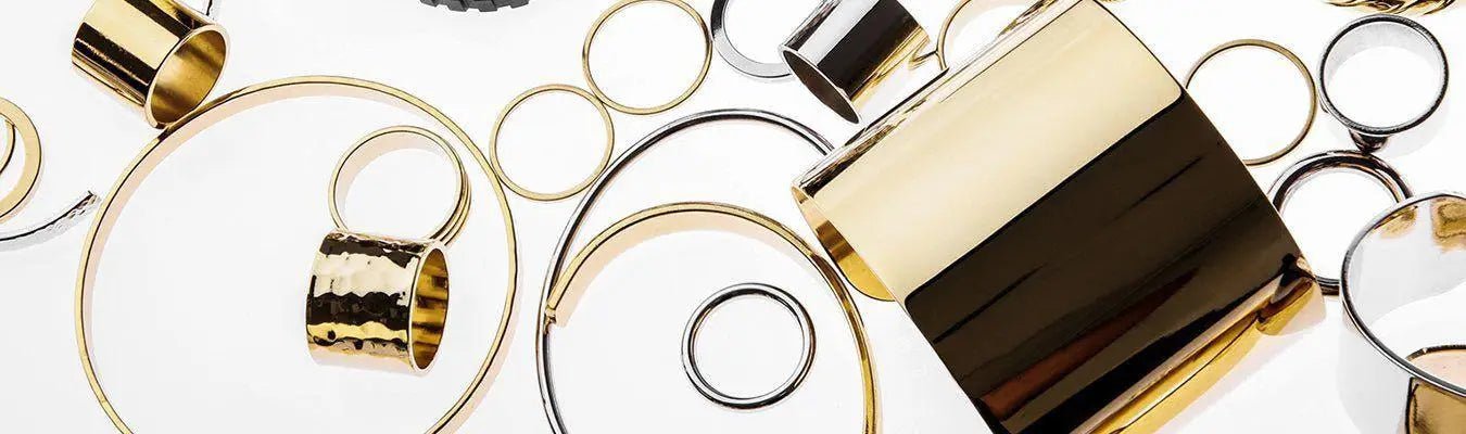 Assortment of gold and silver bangles rings and cuffs from Mens Rings collection