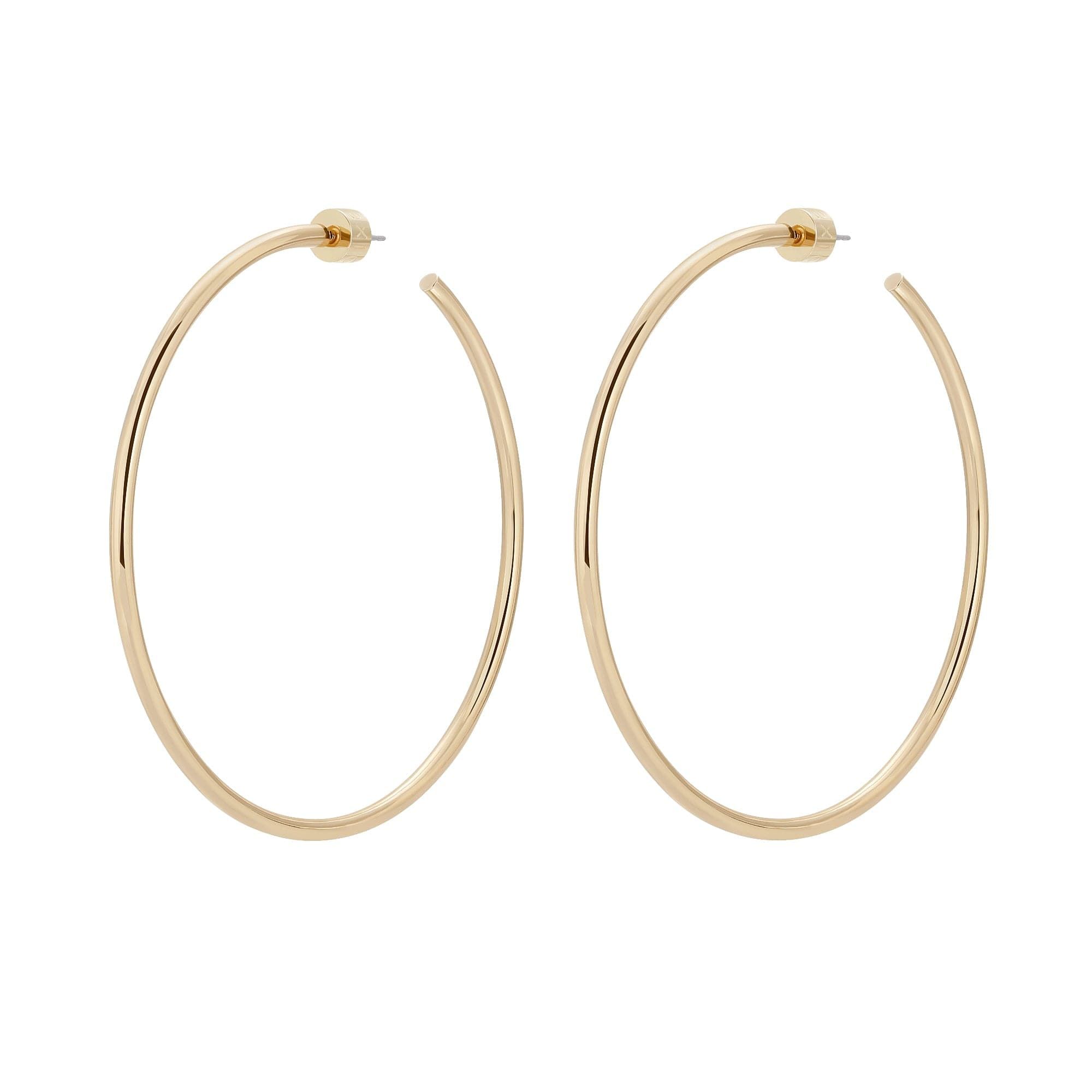Gold hoop earrings in the 2.5 inch Ultimate Hoops jewelry collection
