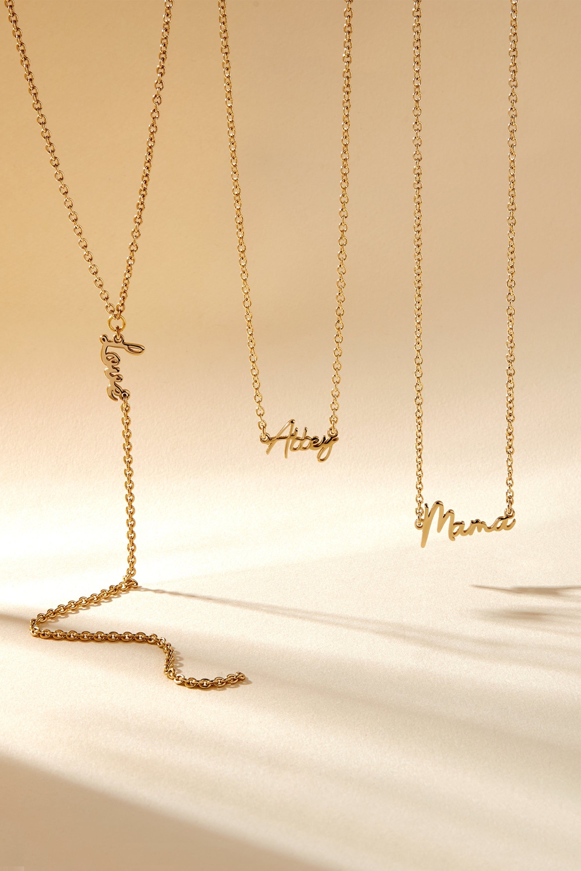 Gold nameplate necklace with dainty script Mama engraving for stylish moms