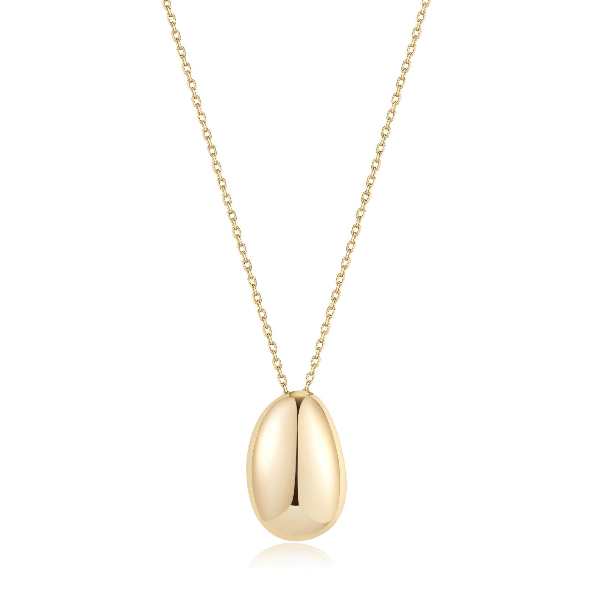Shiny gold teardrop-shaped pendant on a delicate chain from Harmony Pebble Pendant Necklace