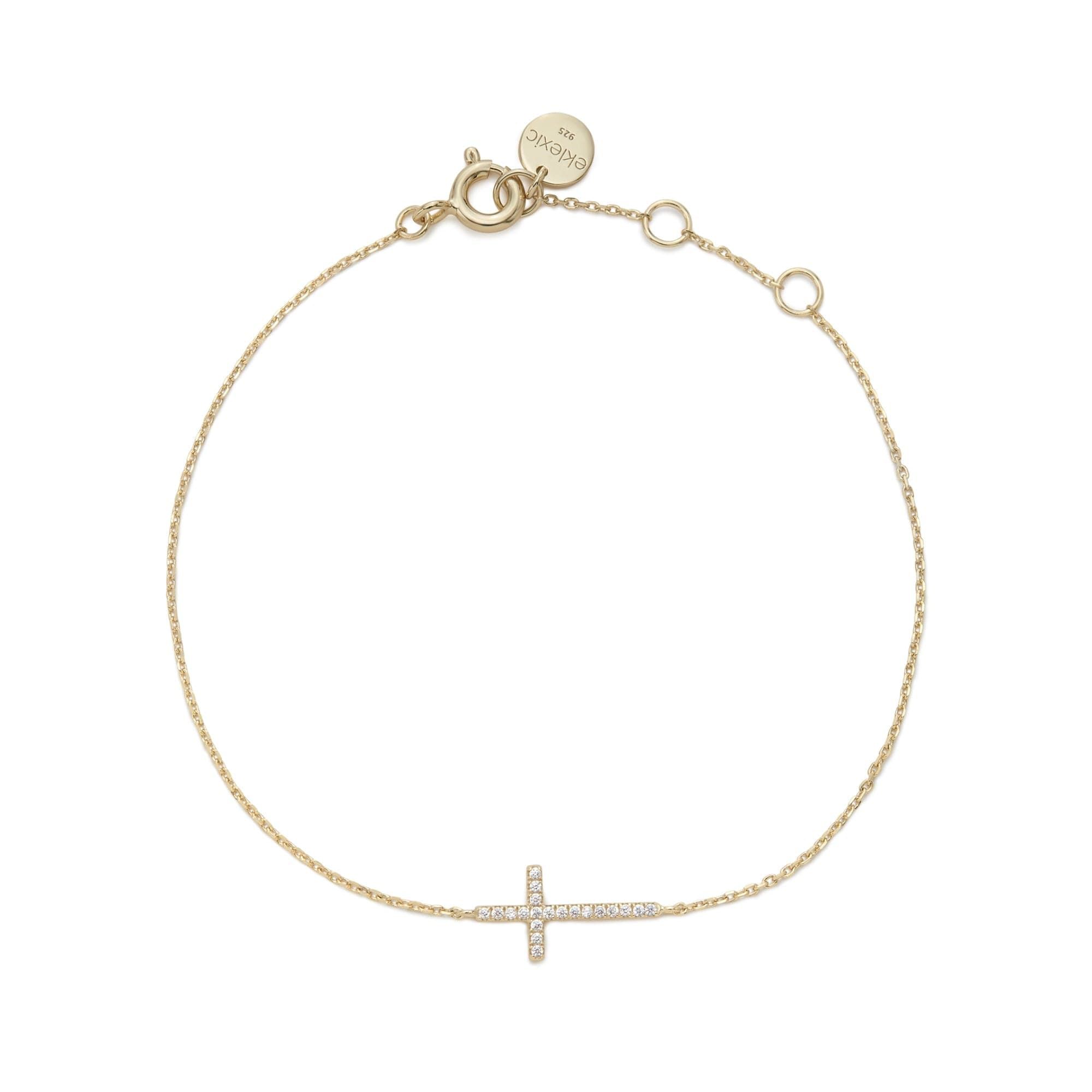 Gold-toned chain bracelet with pave diamond cross charm on Horizontal CZ Cross Bracelet
