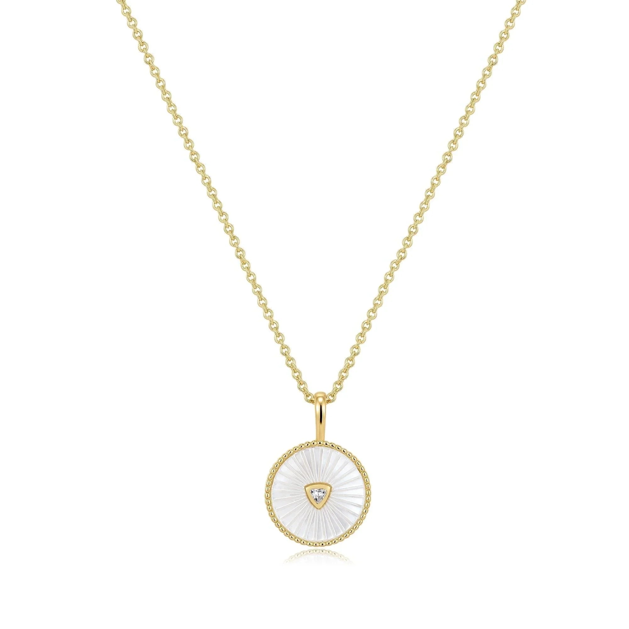 Gold necklace with a Mother Of Pearl pendant and a sparkling CZ stone for that dainty vibe