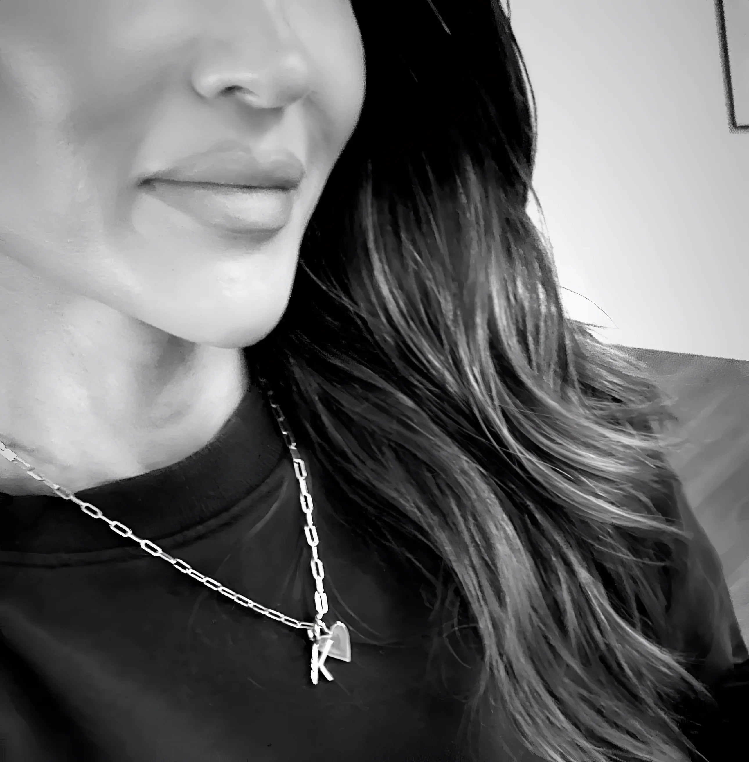 Silver initial necklace with a sleek charm for personalized style