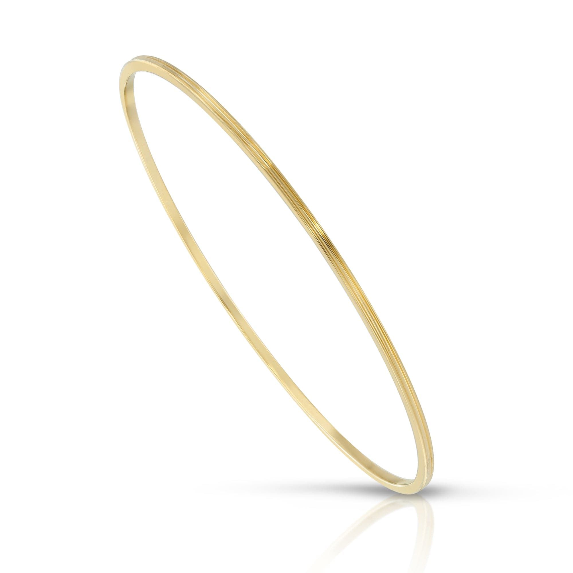 Thin gold bangle from the Skinny Lily Bangle collection perfect for your wrist