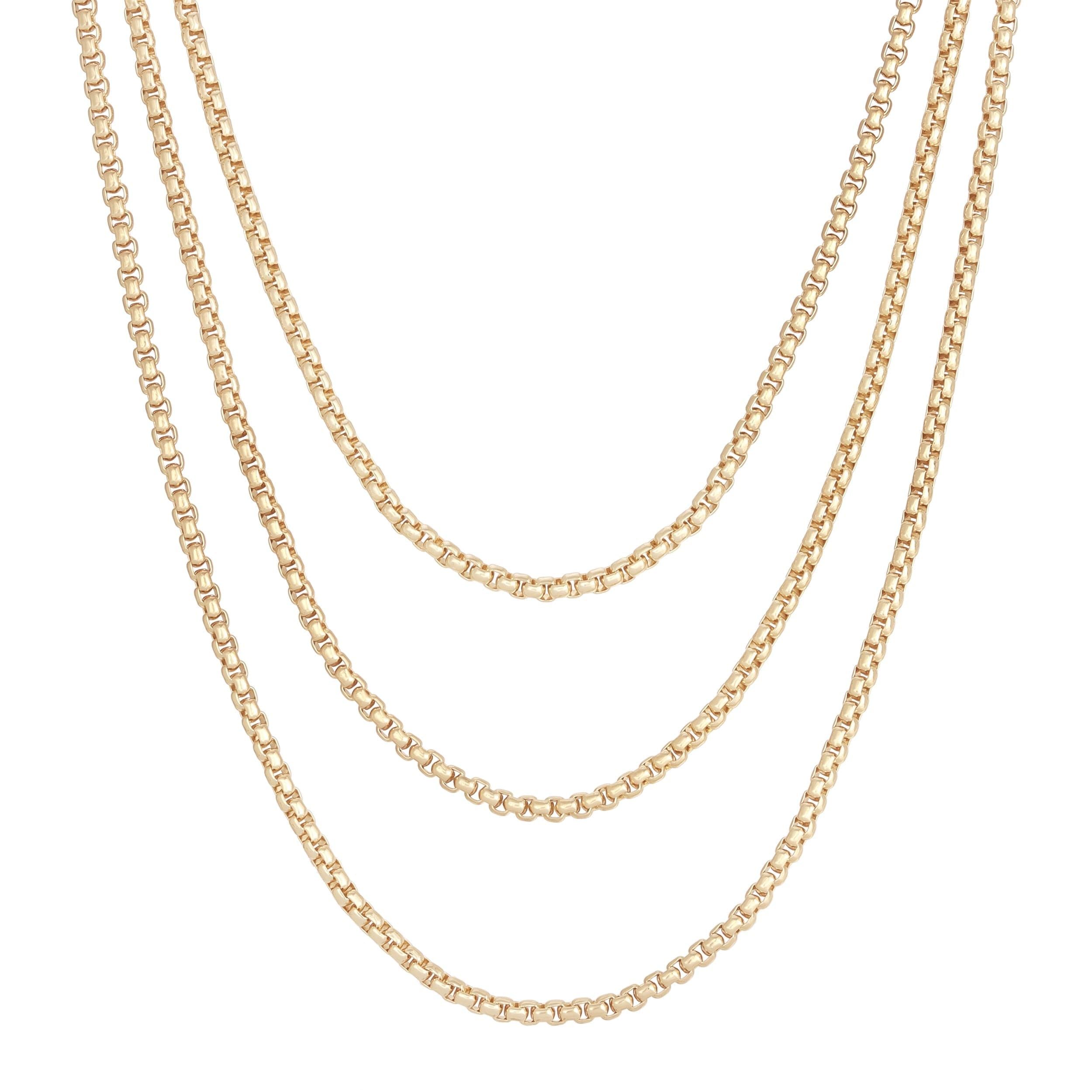 Three gold box chain necklaces on a display for the Triple Layer Thin Luciana Box Chain Necklace