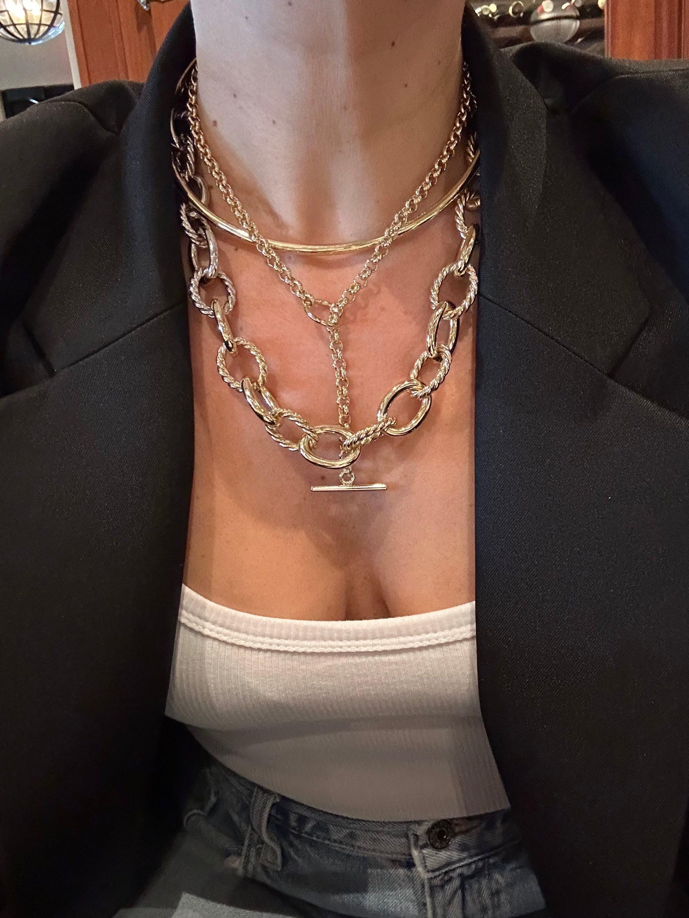 Layered gold necklaces from XL Alternating Twisted Link Toggle Necklace collection