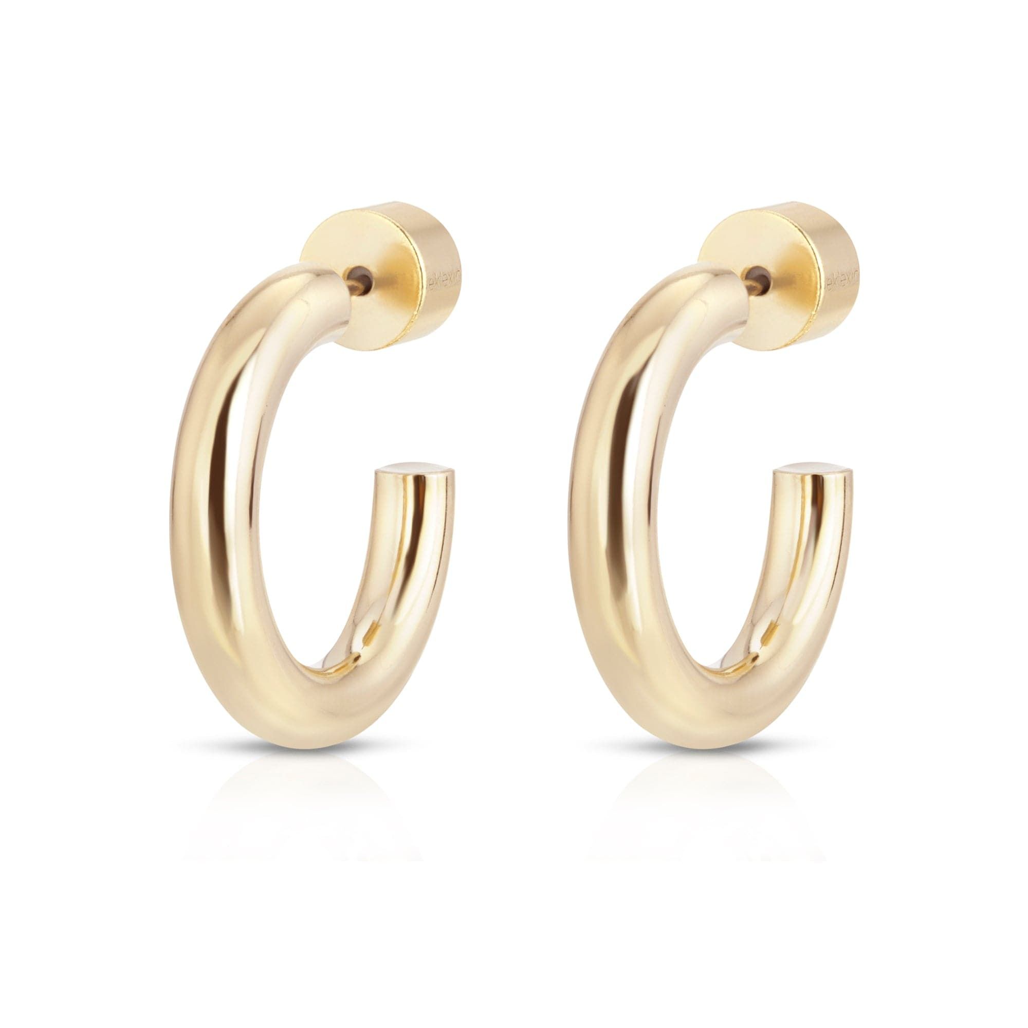 Golden hoop earrings from Zo Huggie Hoops lineup perfect for stylish looks