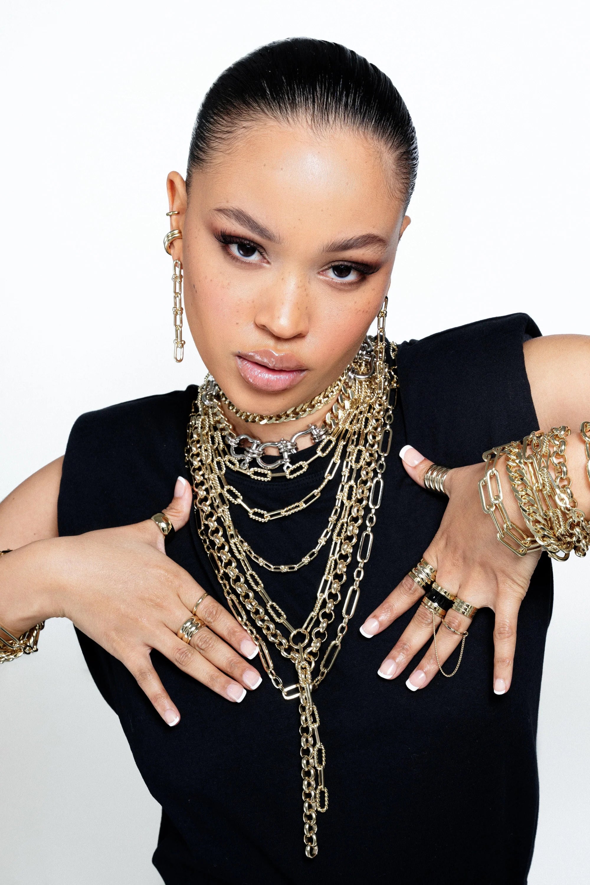 Woman adorned with elegant Margaux 6 Link Drop Earrings showcasing stunning link drop earrings