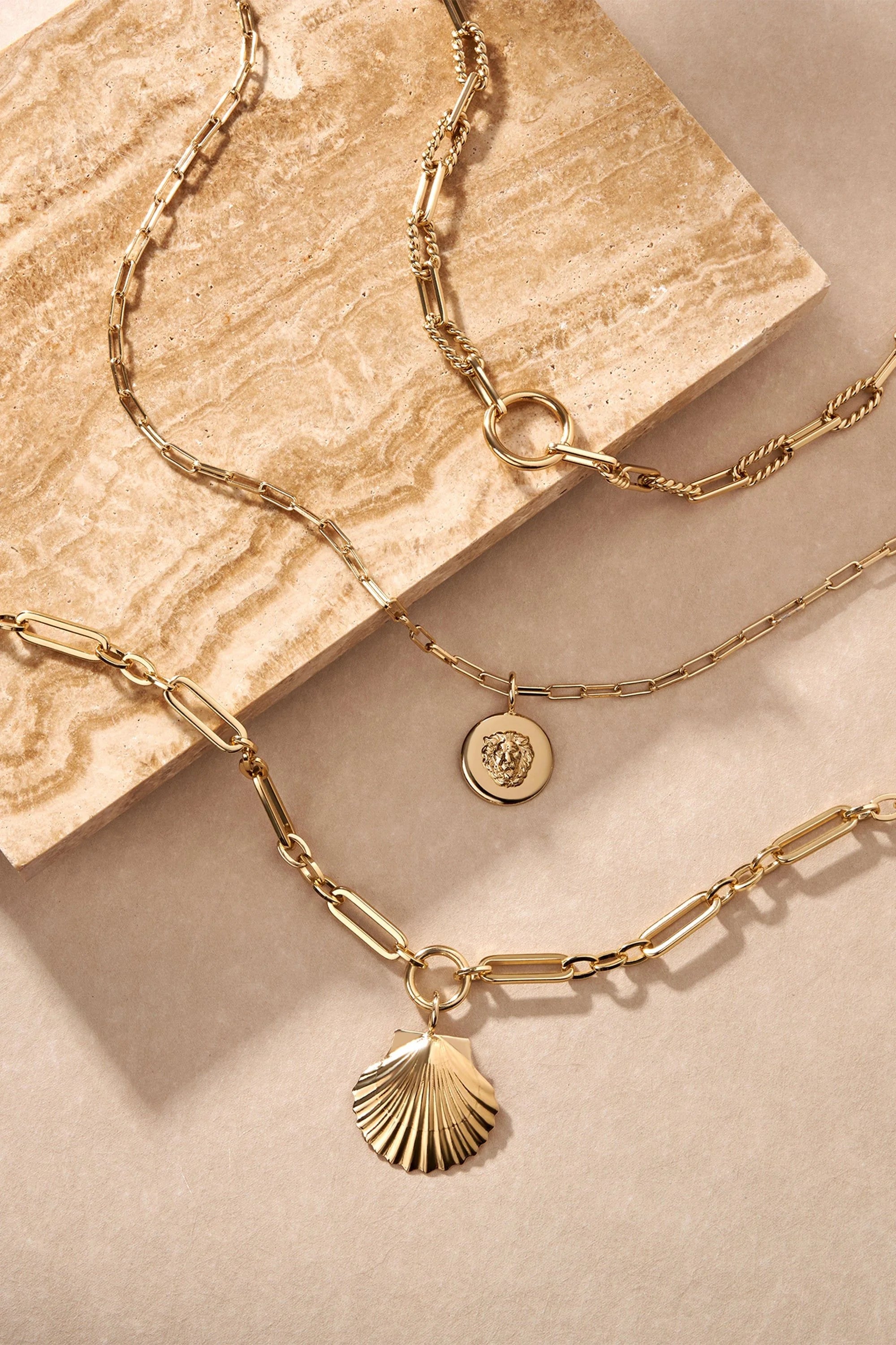 Shelly Necklace with Gold-toned layered necklaces in recycled brass and 14k gold plated ecoat