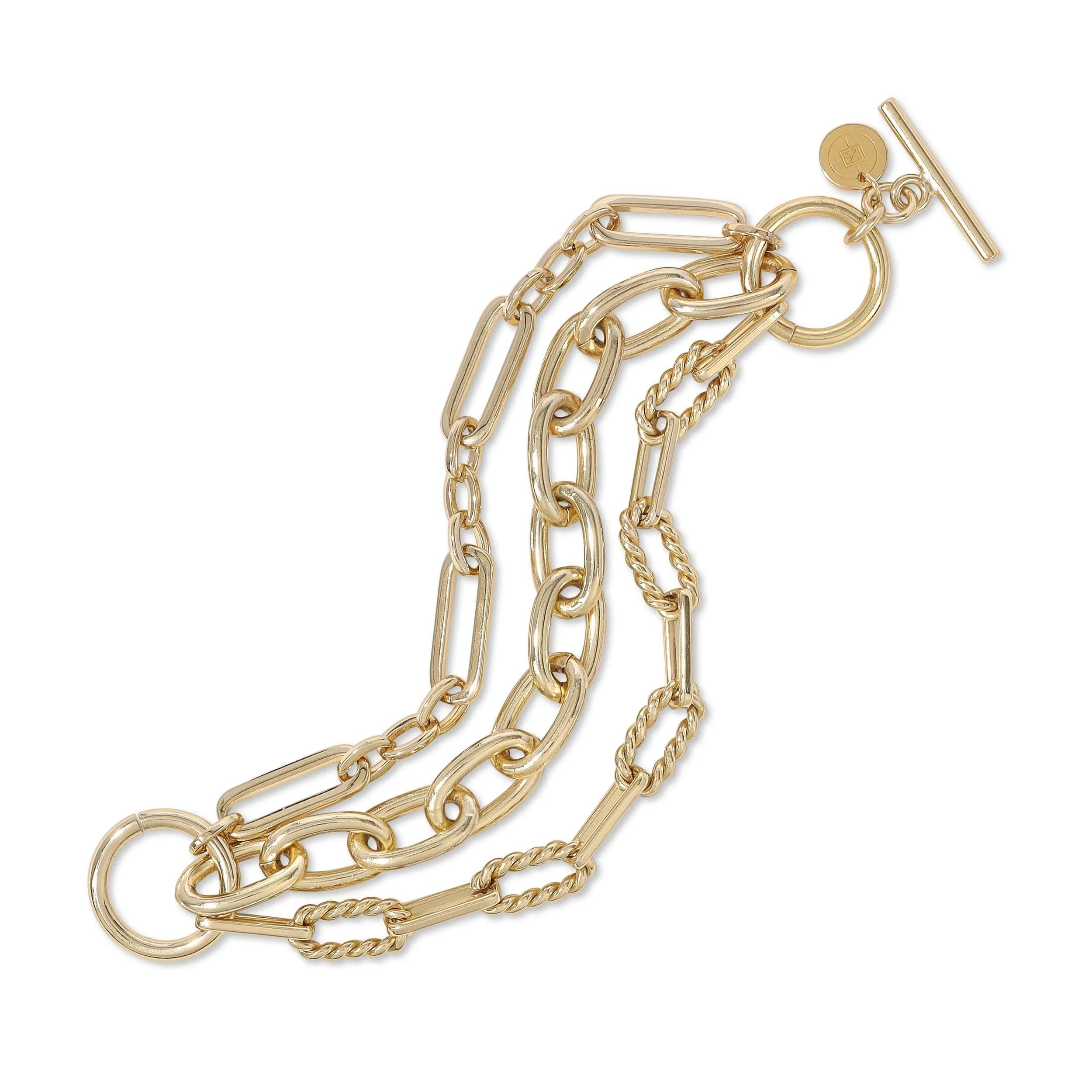 Gold-toned multi-strand chain bracelet with recycled brass finishes and rhodium plating by Enzo & Alana