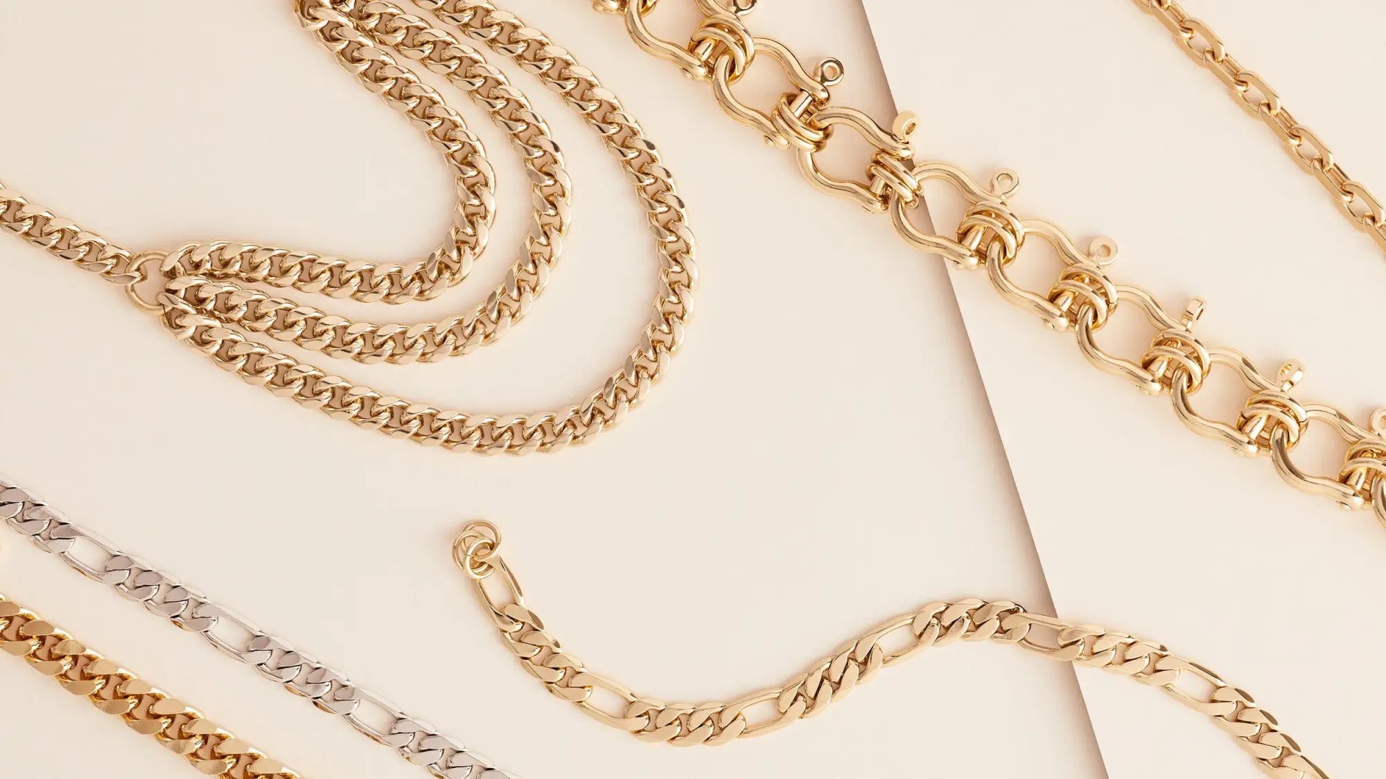 Gold and silver chain necklaces and bracelets with various link styles in the Chains collection