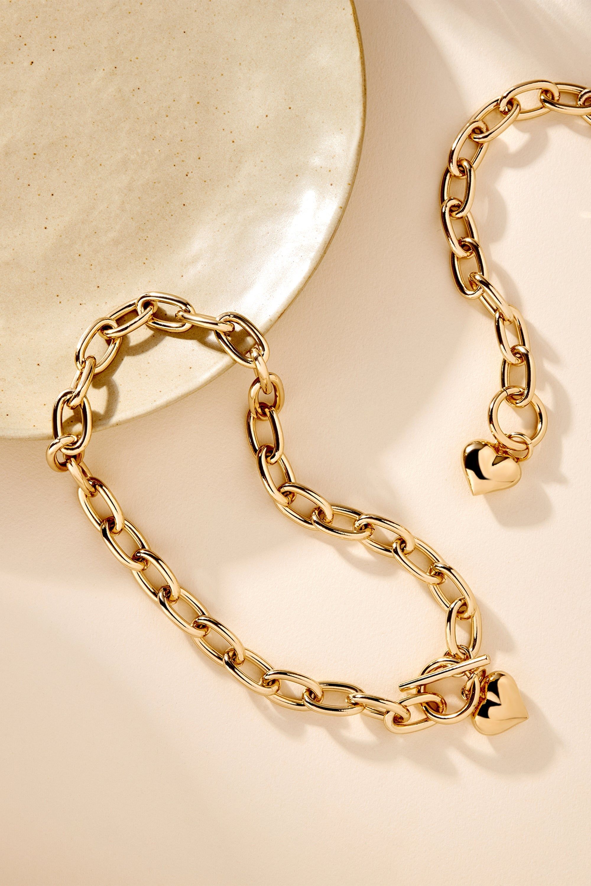 Gold chain necklace with cute heart charms from the Alana Puffy Heart Charm Bracelet collection