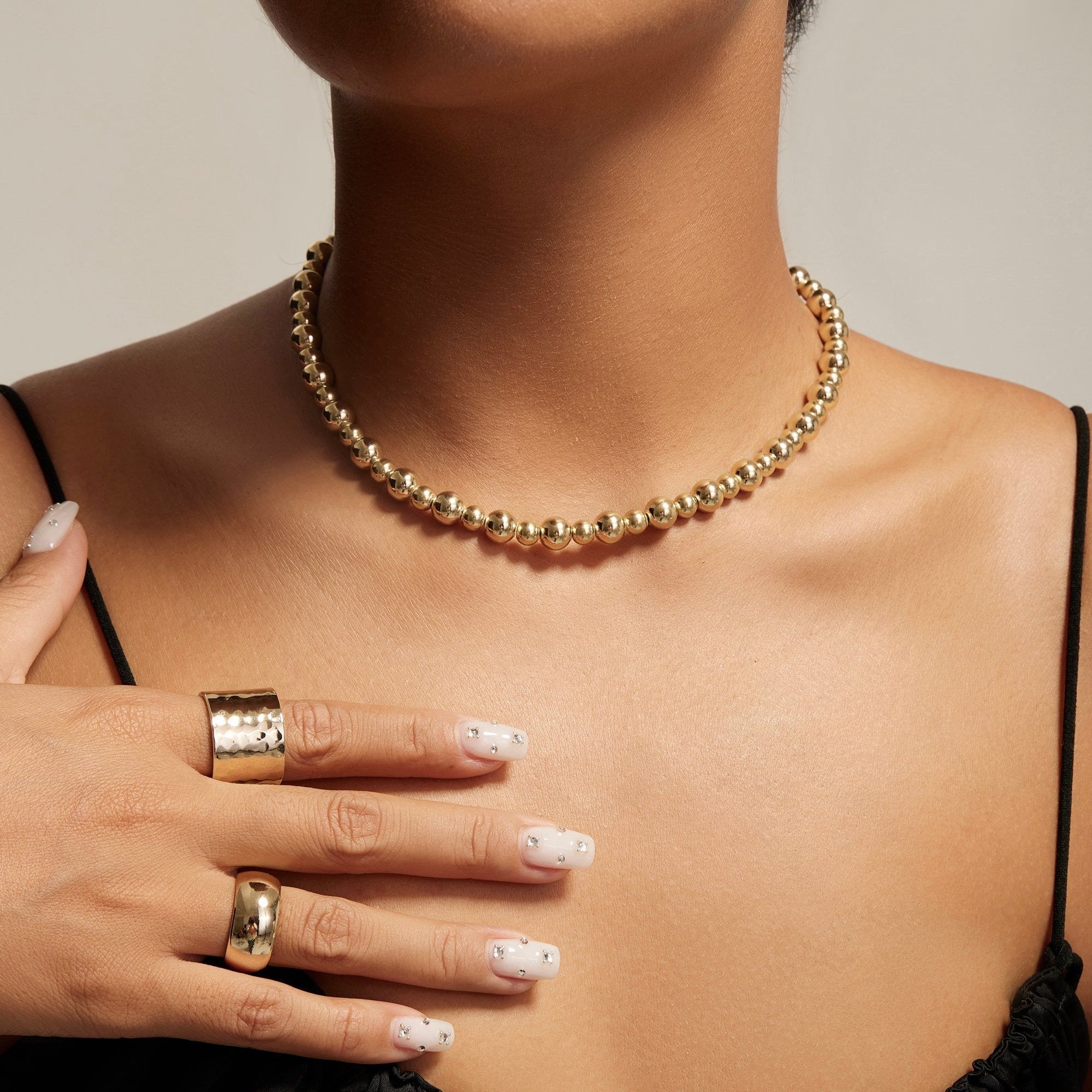 Gold beaded necklace from Beau Bead Necklace collection for trendy jewelry lovers