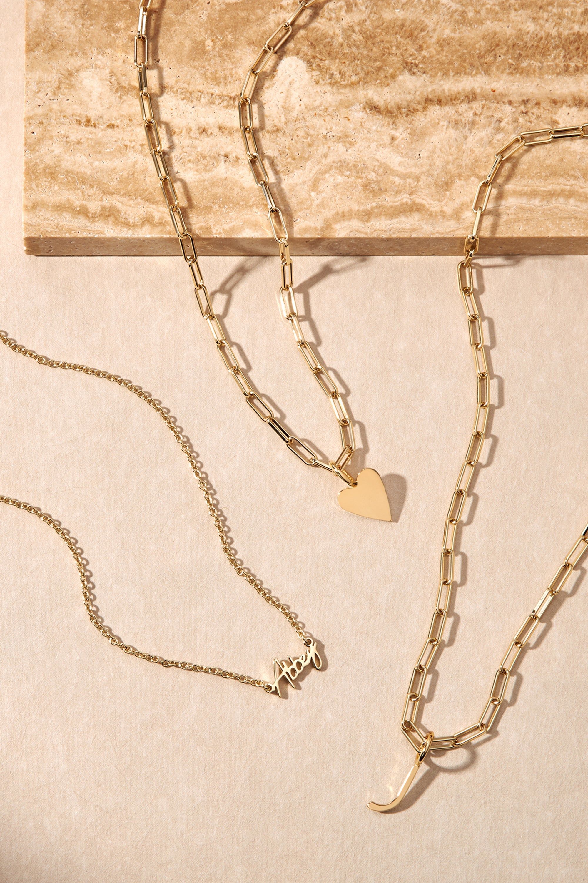 Gold necklaces with heart pendant Mom charm and J-shaped pendant in Essential Letter Charm Necklace