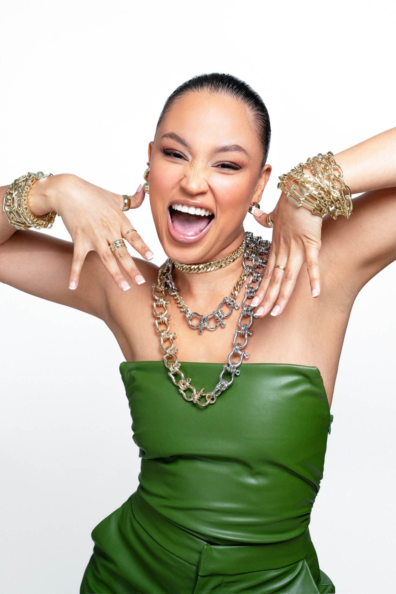 Happy woman wearing Two Toned XL Harrison Necklace and gold jewelry style