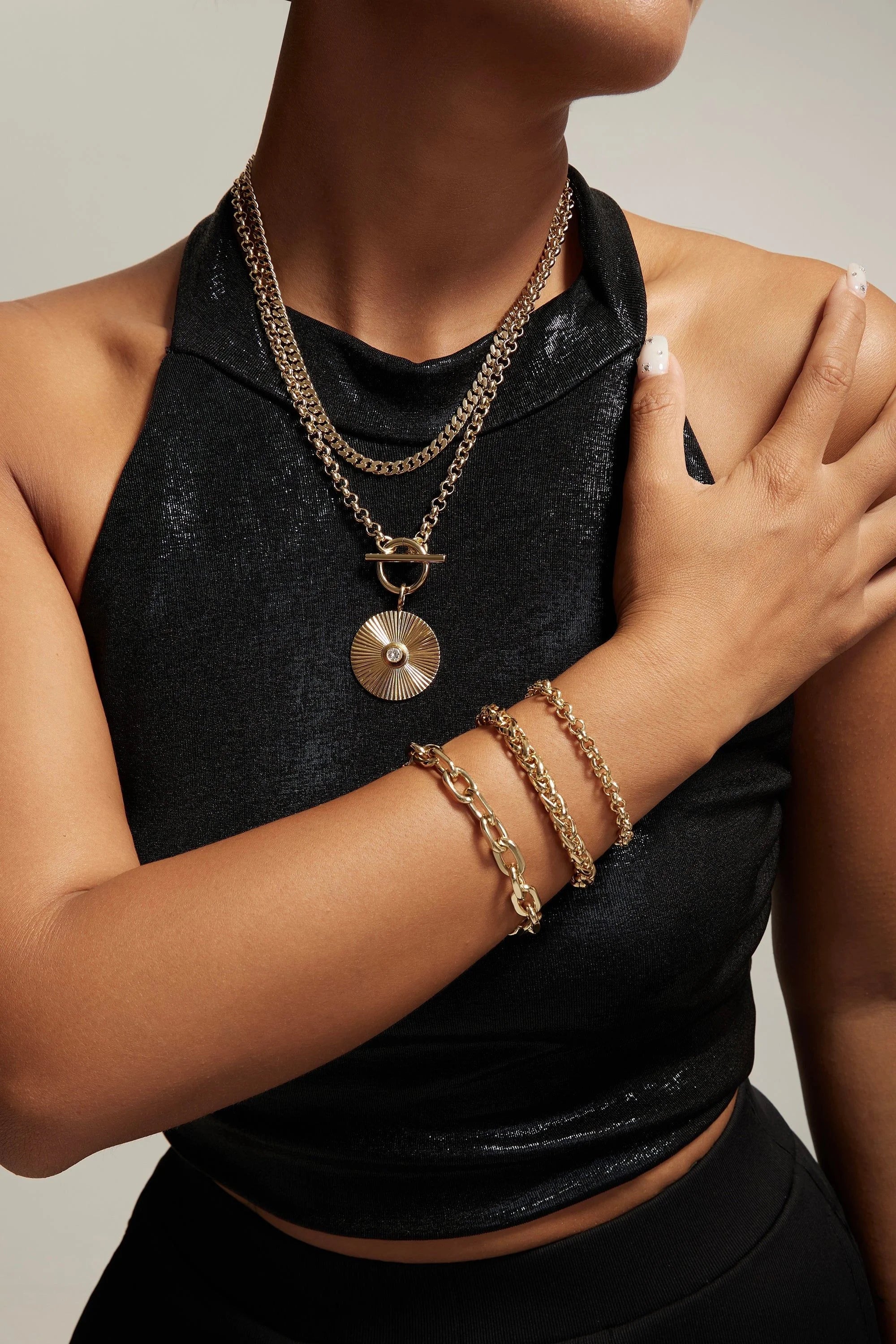 Gold-toned jewelry set featuring Esmé Bracelet with Chopin Chain and 7mm wide clasp