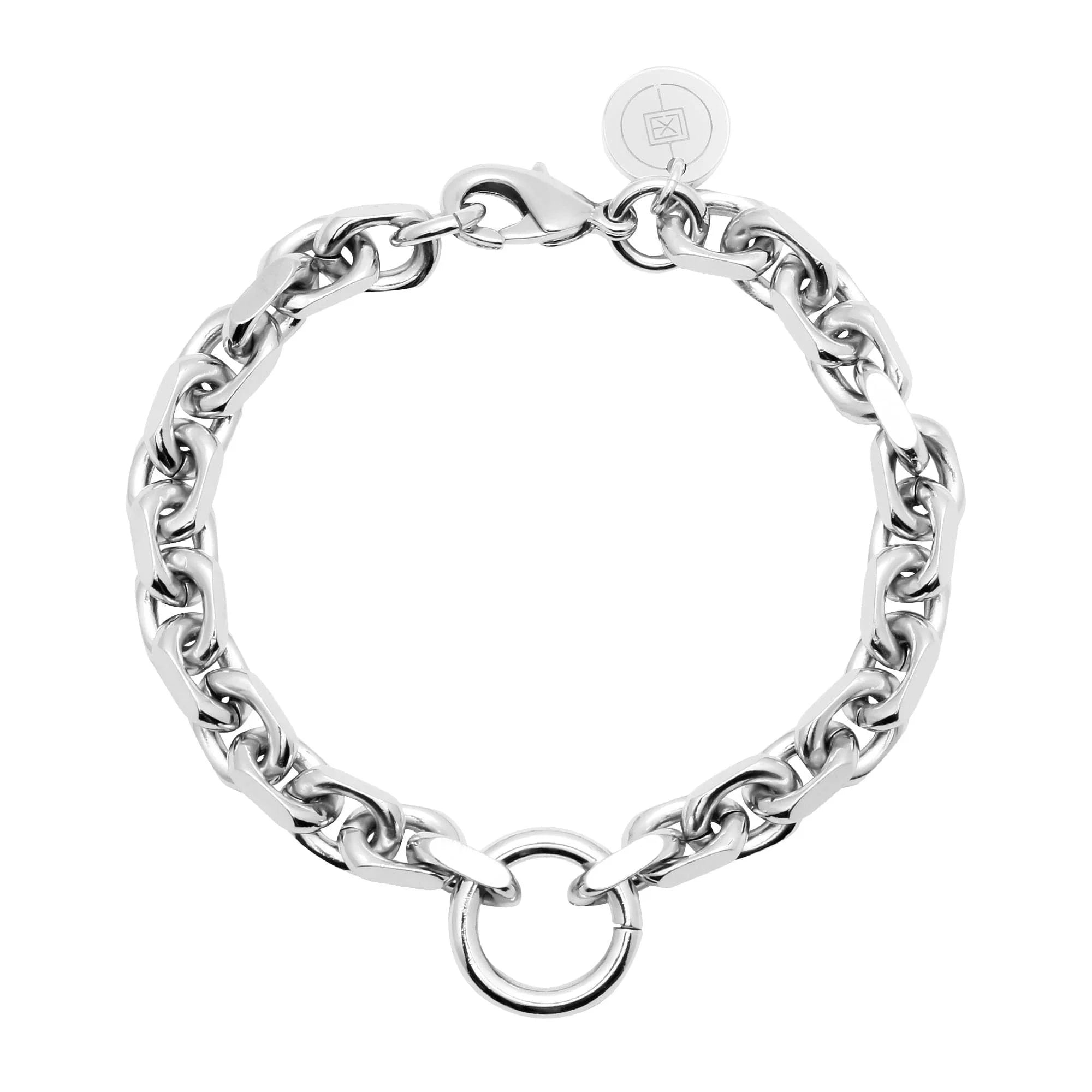 Silver-toned Gigi Bracelet with brass link chain and circular pendant featuring lobster clasp