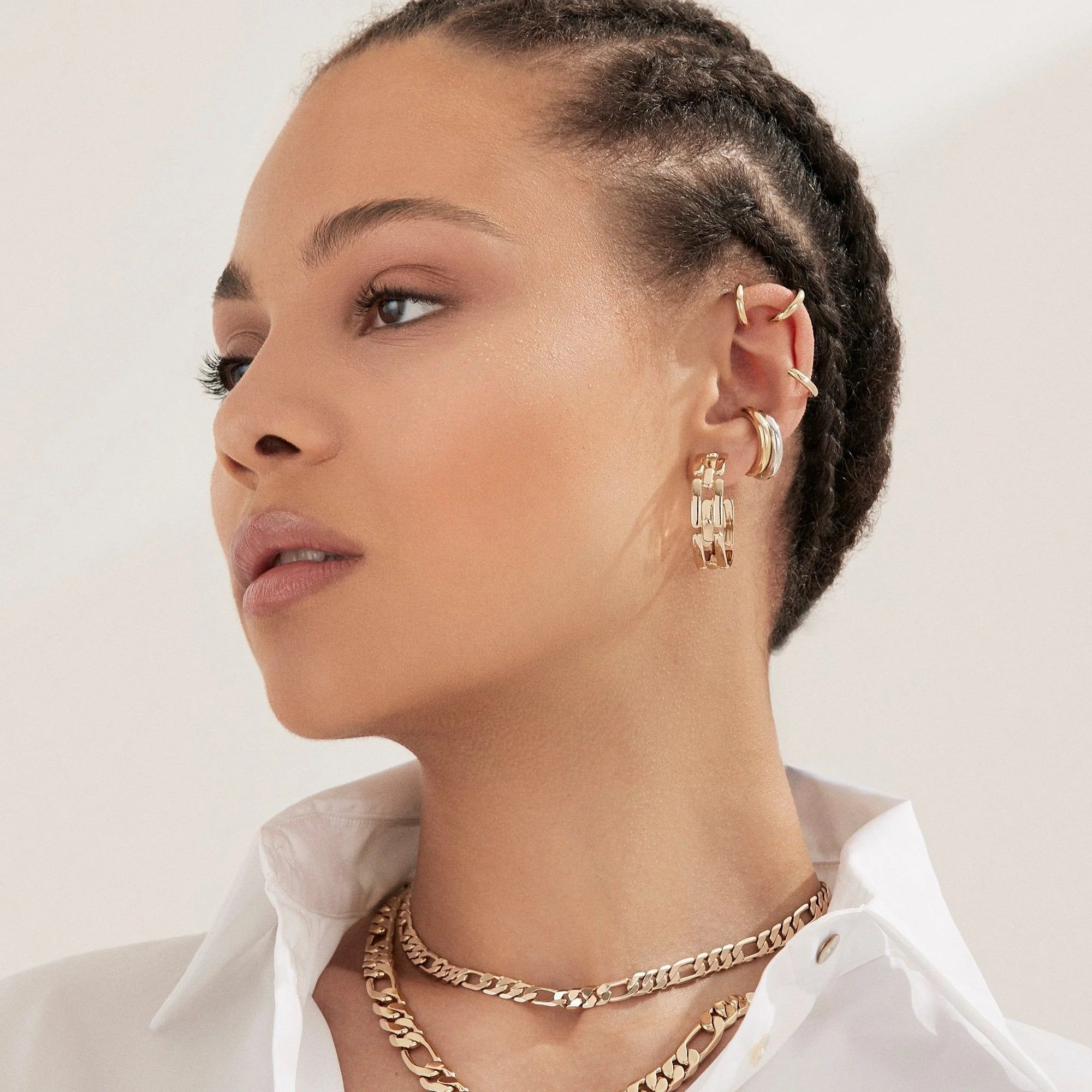 Woman wearing the Lisa Ear Cuff made of recycled brass, easy & comfortable jewelry