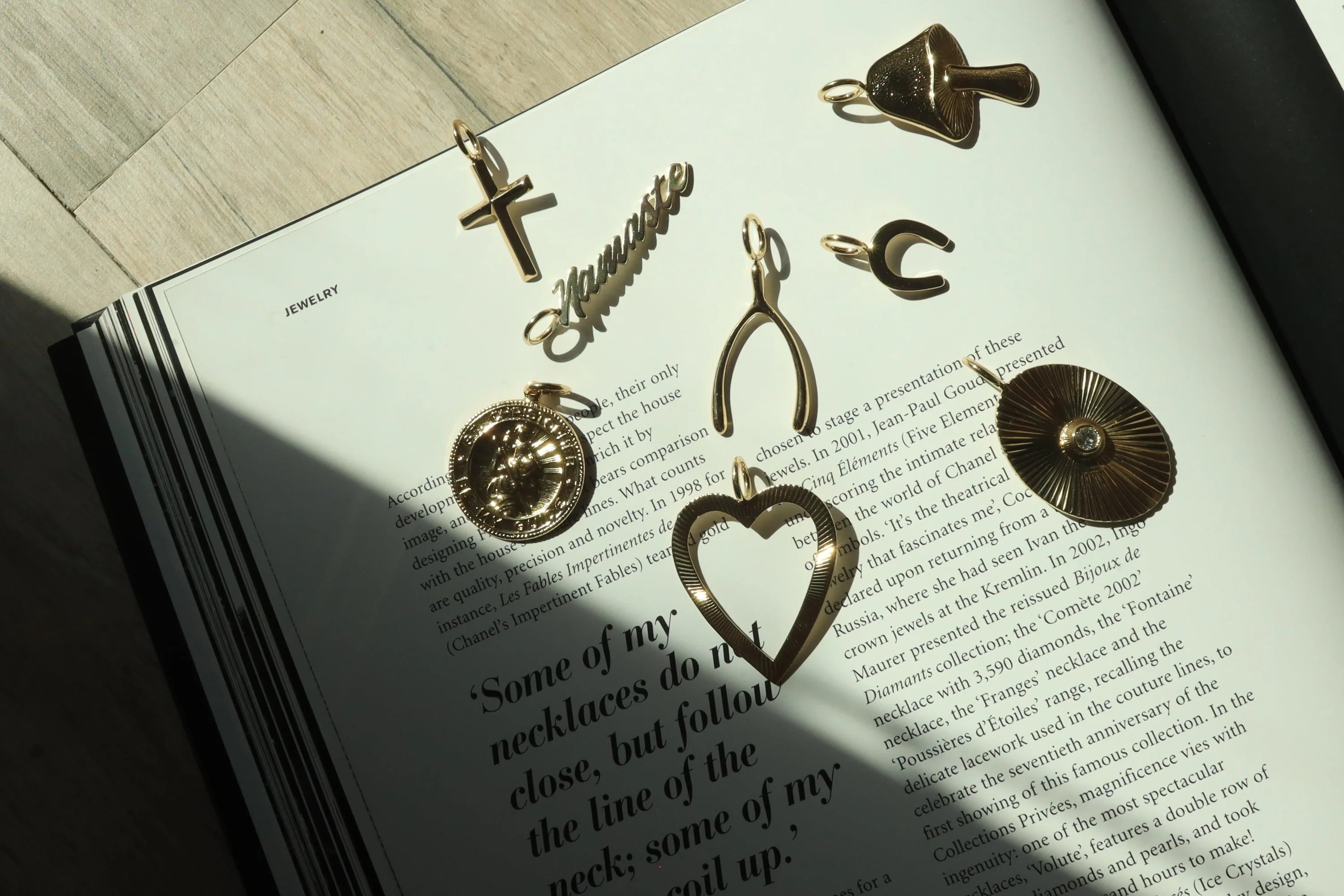 Gold-toned charm pendants in recycled brass finishes for Ecoat Wishbone Pendant with wishbone pendant measures