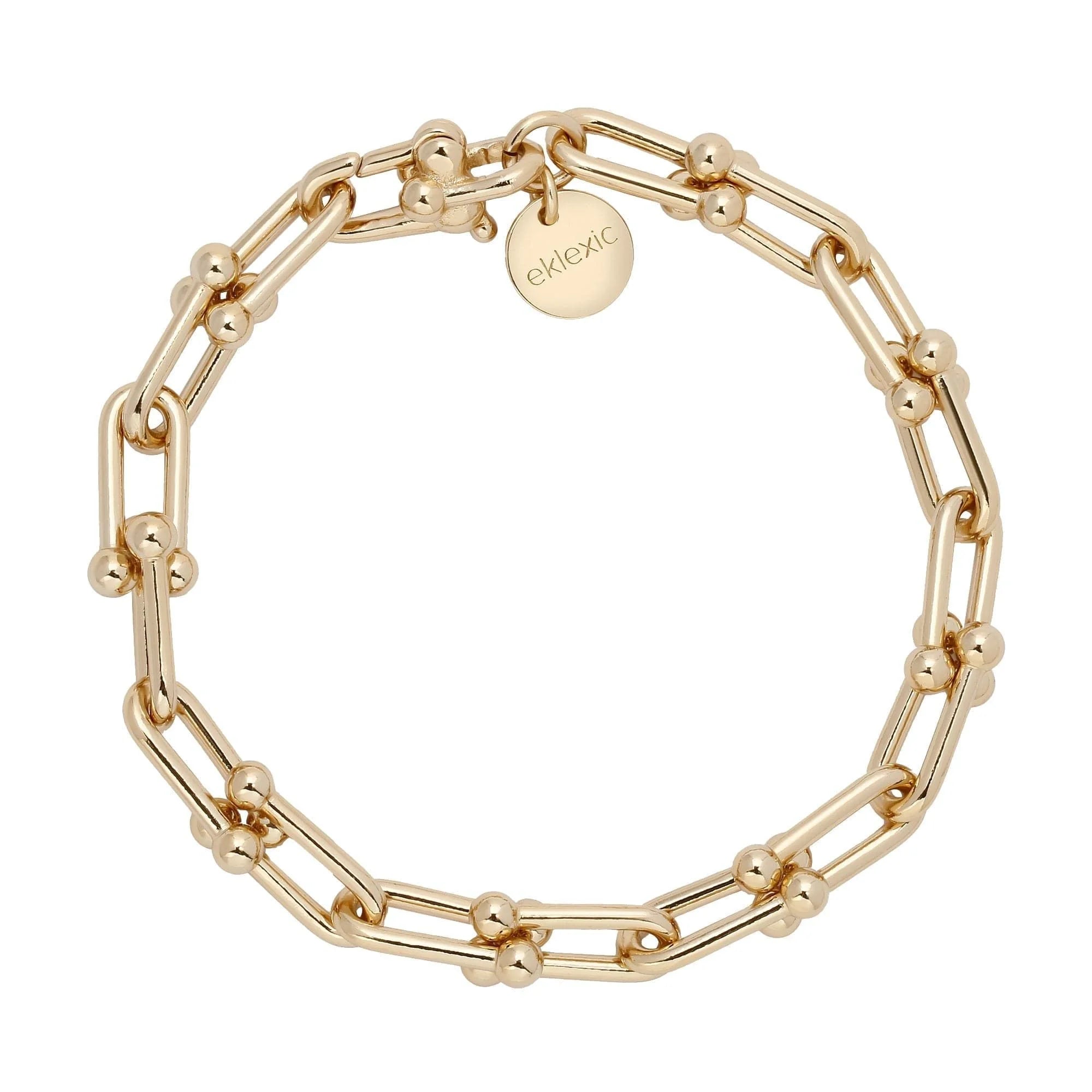 Gold-toned chain link bracelet with custom U link fastened in the Margaux Anklet product