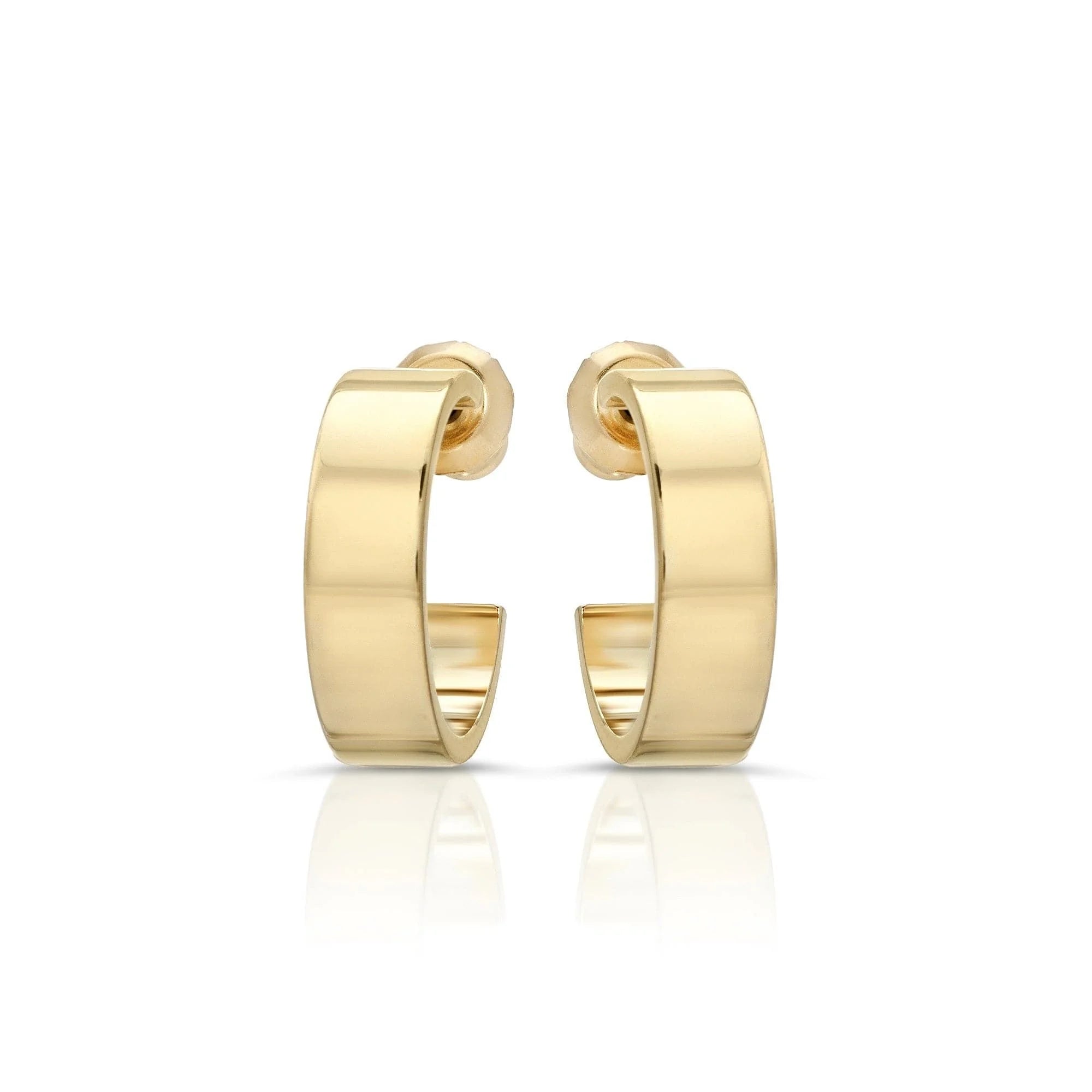 Mini Cora Huggie Hoops in yellow gold rhodium featuring a pair of gold hoop earrings
