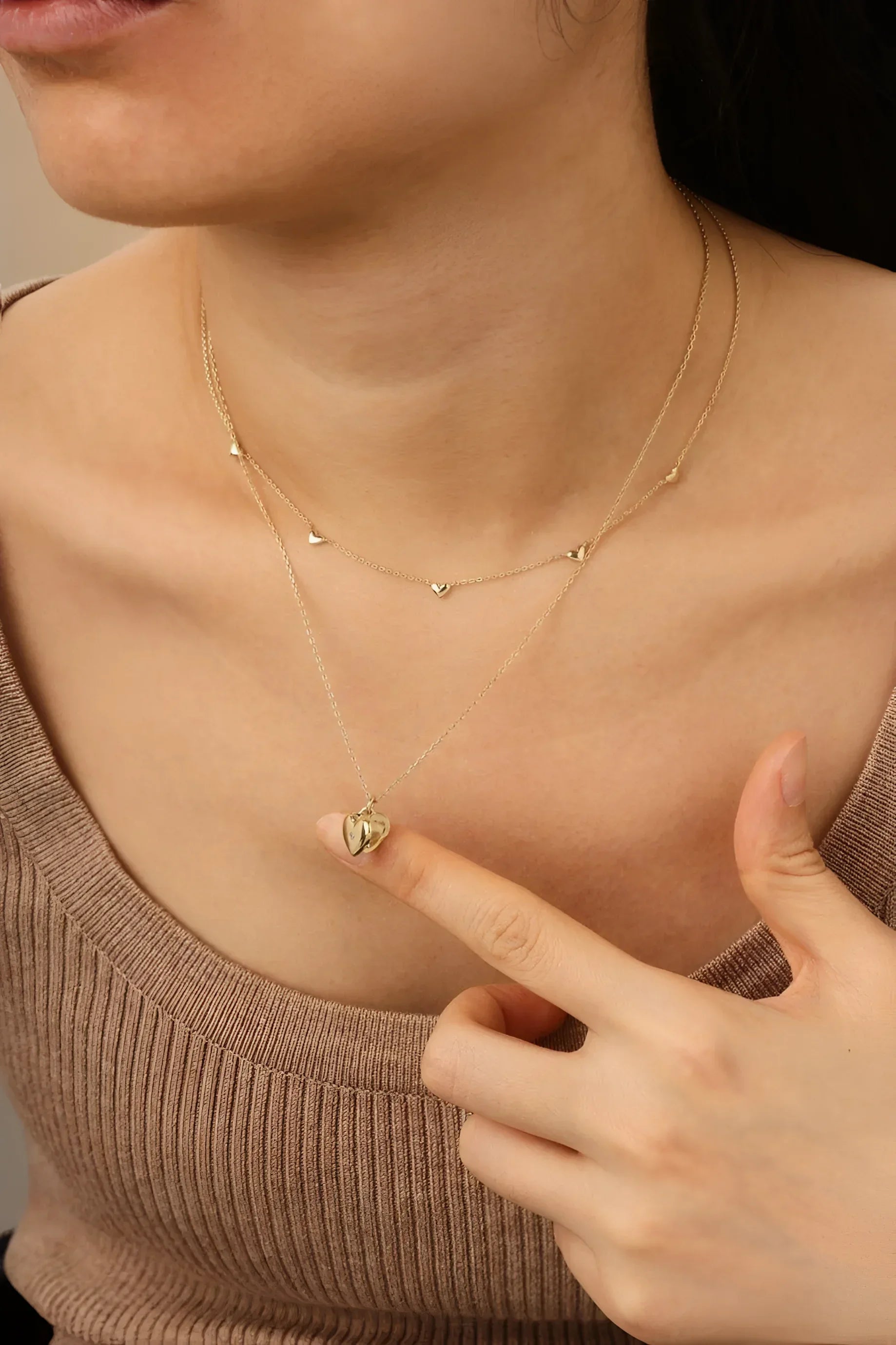Gold layered necklaces featuring the Mini Heart Locket Necklace With CZ in 14k gold vermeil