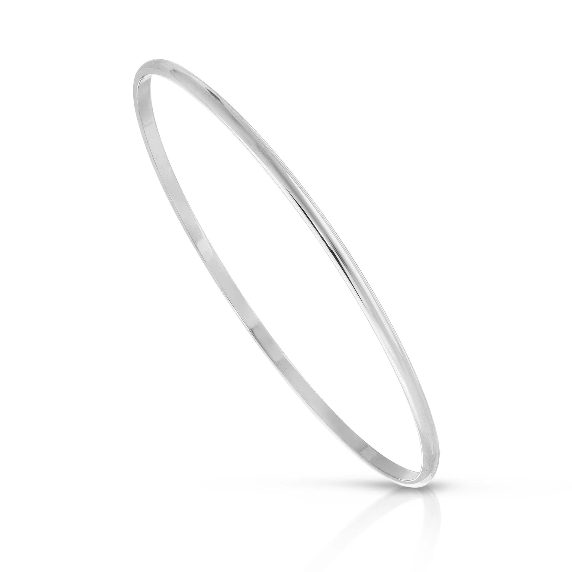 Silver bangle bracelet from Skinny Lucy Bangle made with recycled brass and Lucy recycled materials